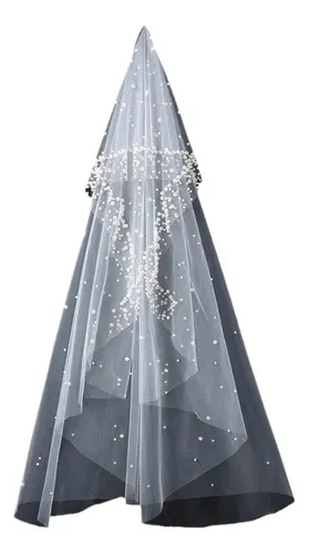 El Tocado De La Novia Está Decorado Con Cuentas Redondas.