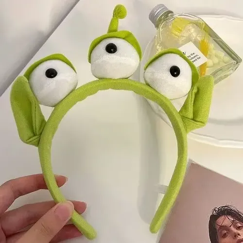 Vincha Rana De Tres Ojos Peluche 2 Piezas Verde
