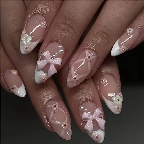 – Uñas Postizas Florales Adornadas Con Un Moño Rosa. =