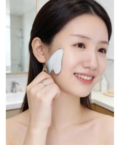 Masajeador Facial Gua Sha Acero Inoxidable Corazón