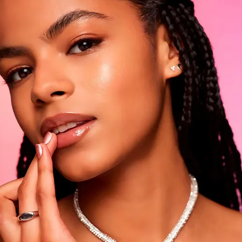 Labial Revlon Super Lustrous Glimmer Gloss Blanco