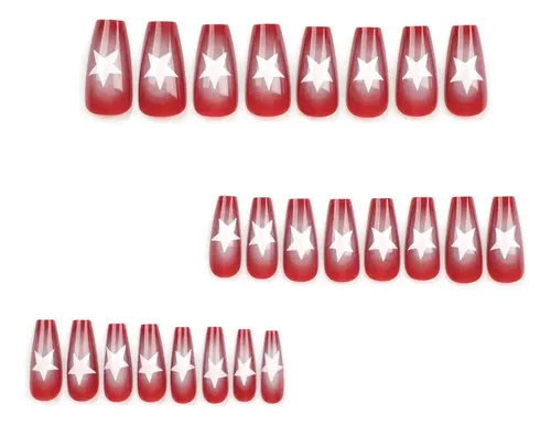 Uñas Decoradas Con Estrellas Rojas De Cinco Puntas