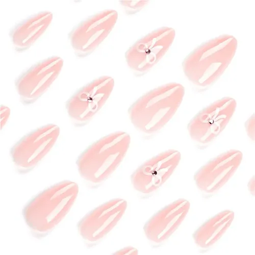 Uñas Decoradas Con Un Lazo Blanco Minimalista