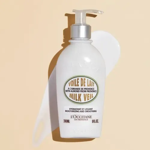 Fluido para cuerpo L’Occitane Velo de leche de almendra en dosificador 240mL almendras