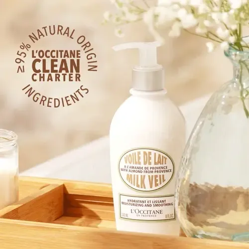 Fluido para cuerpo L’Occitane Velo de leche de almendra en dosificador 240mL almendras