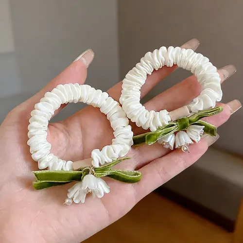 Elegante Cinta Para El Pelo Con Forma De Lirio De Los Valles