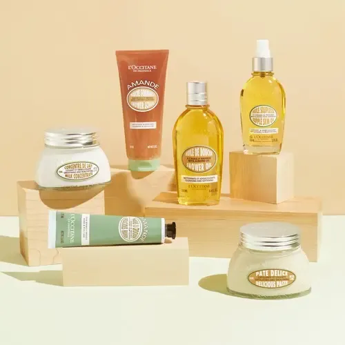 Fluido para cuerpo L’Occitane Velo de leche de almendra en dosificador 240mL almendras