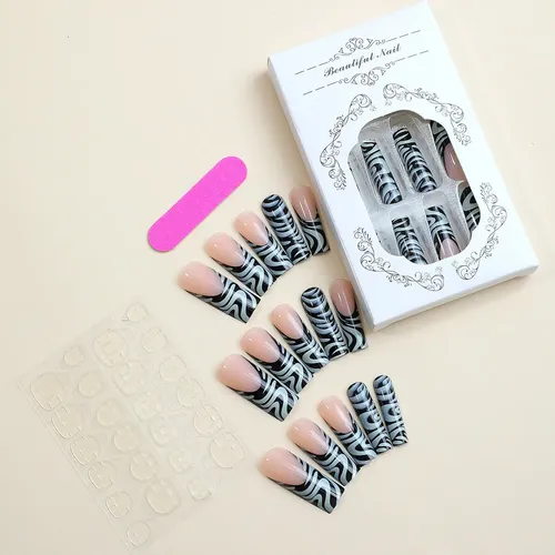 Dos Cajas De Uñas Postizas Con Rayas De Cebra.